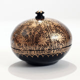 Black and gold round jewelry and trinket box with handled lid