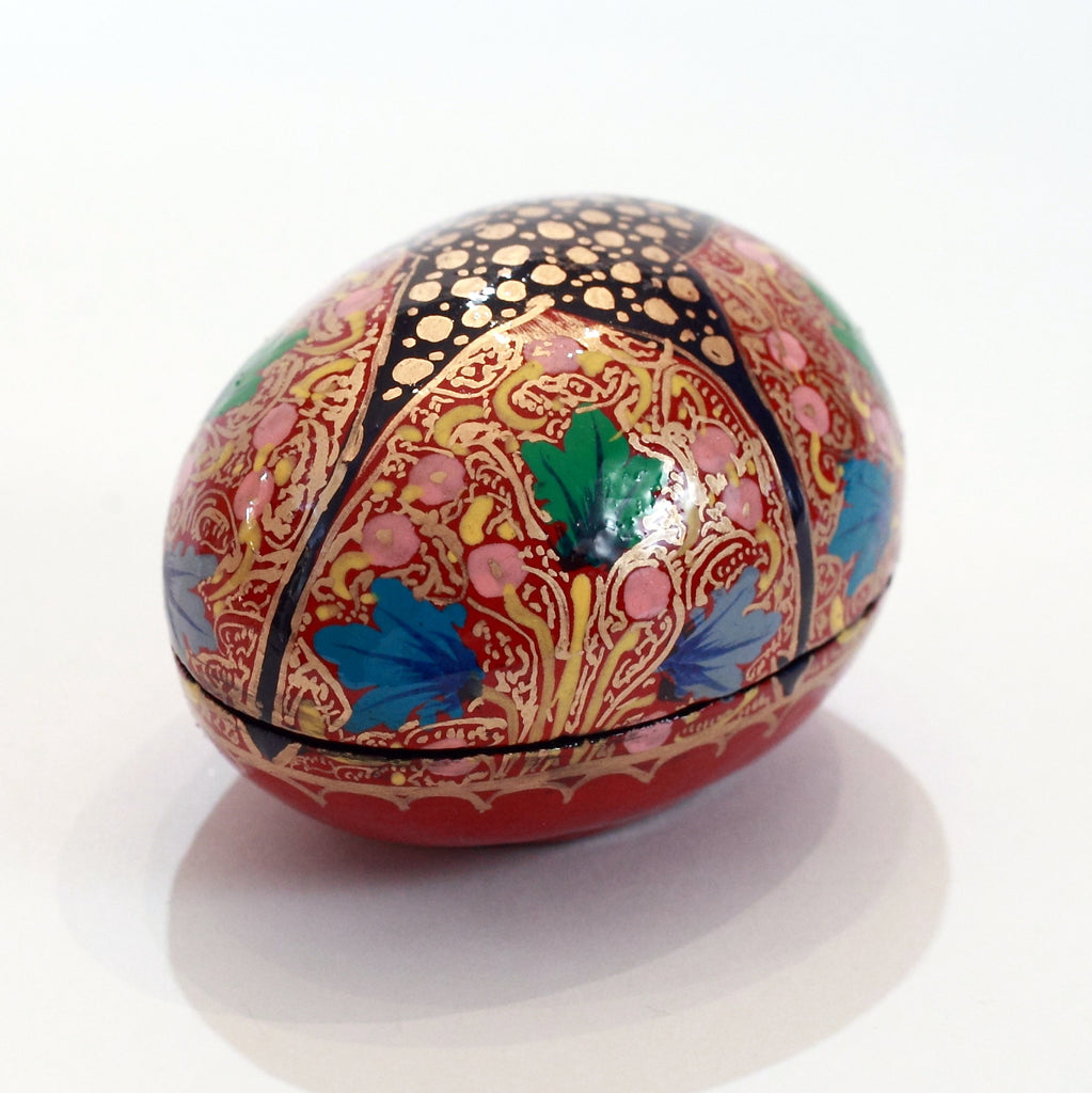 Red and black egg-shaped paper mache box